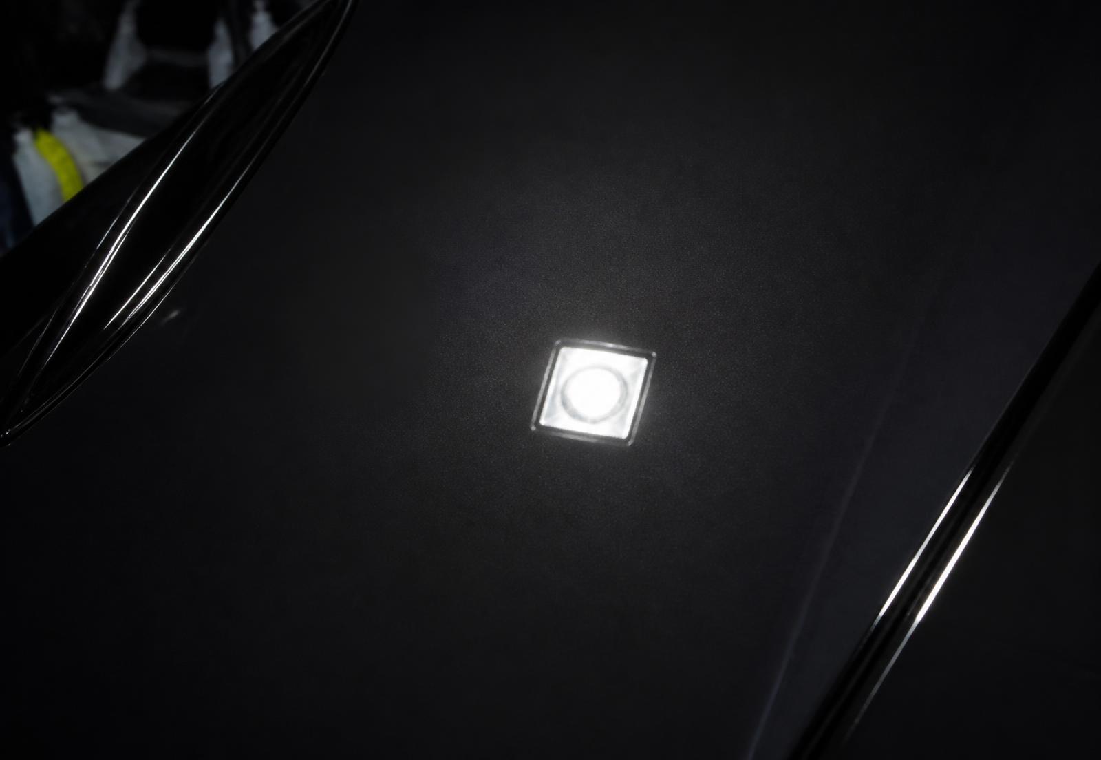 Corrected black paint with a sharp, clear reflection